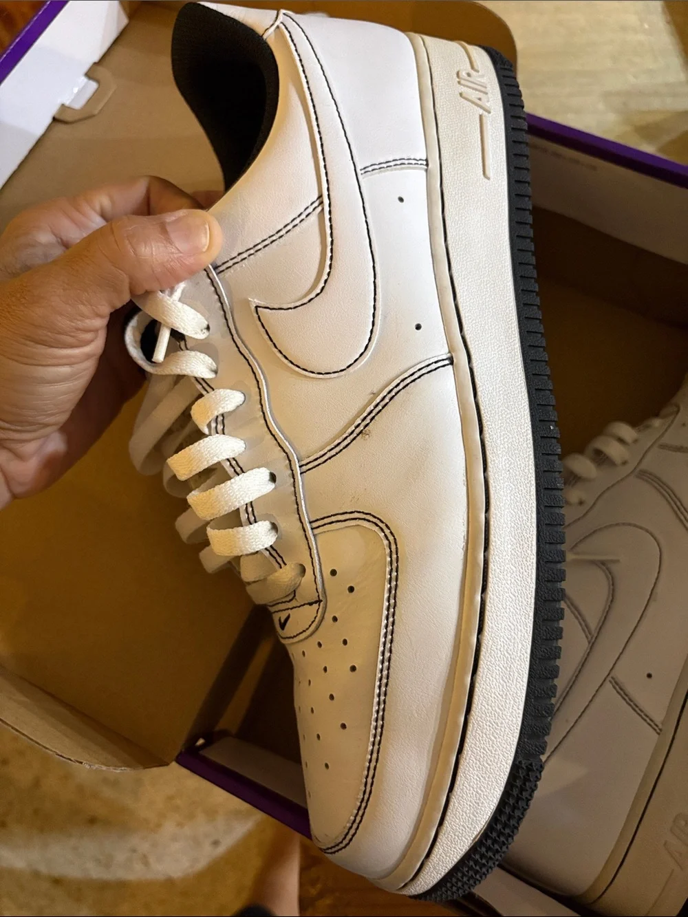 Nike White Leather Low-Top Sneakers with Black Soles